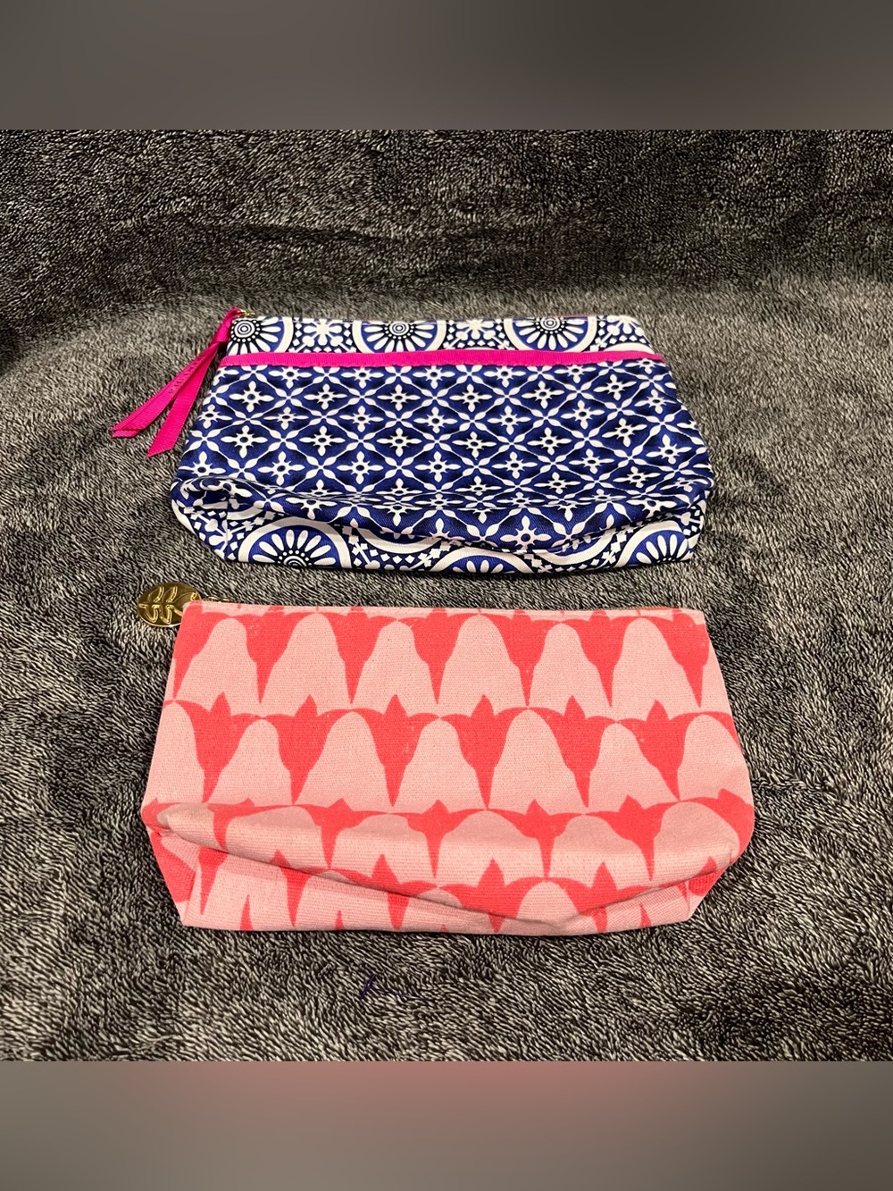 Two Estee Lauder cosmetic bags